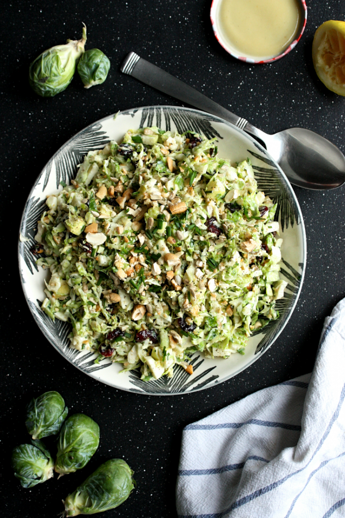 Brussel Sprout Slaw with Cranberries, Cashews, and Apples