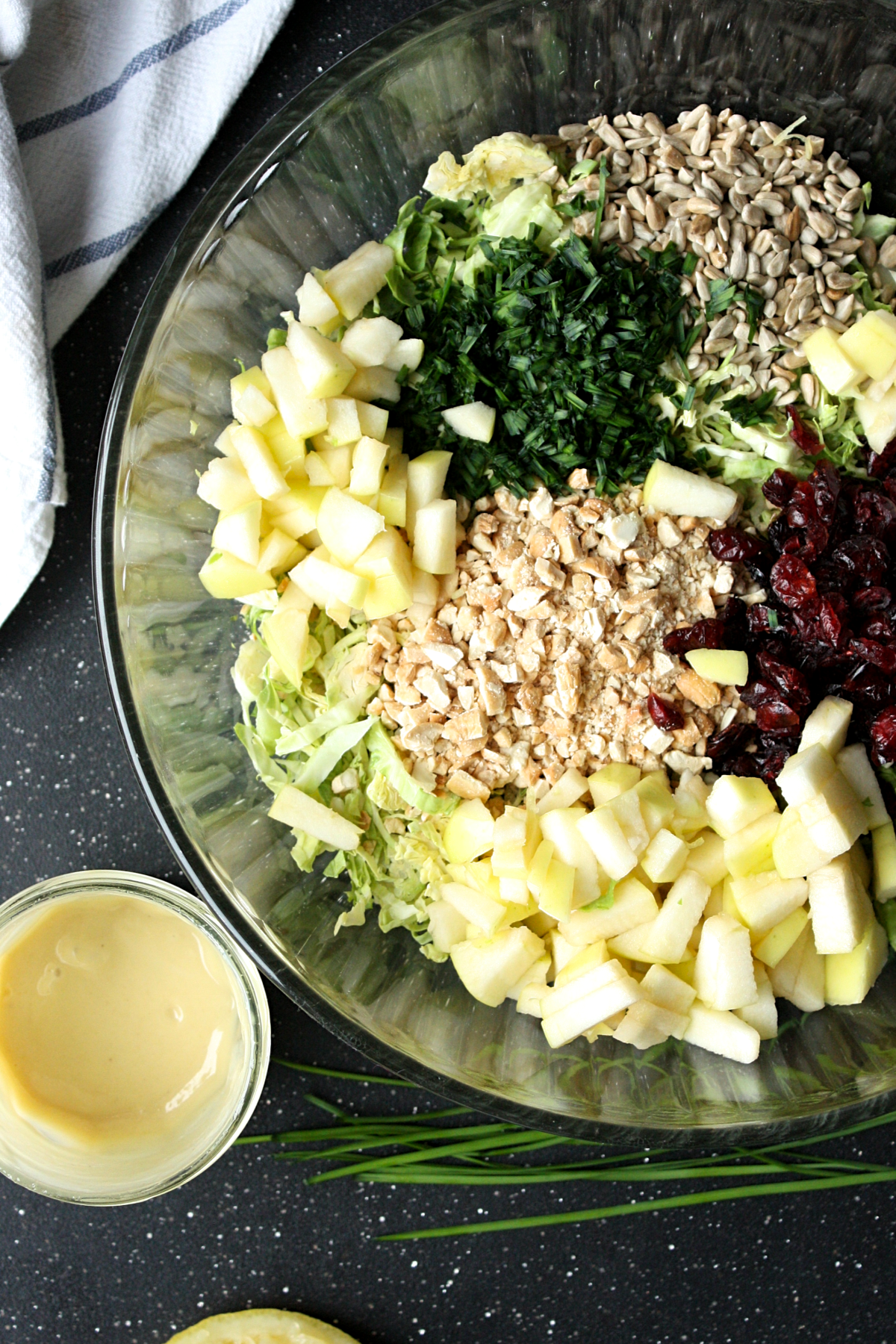 Brussel Sprout Slaw with Cranberries, Cashews and Apples