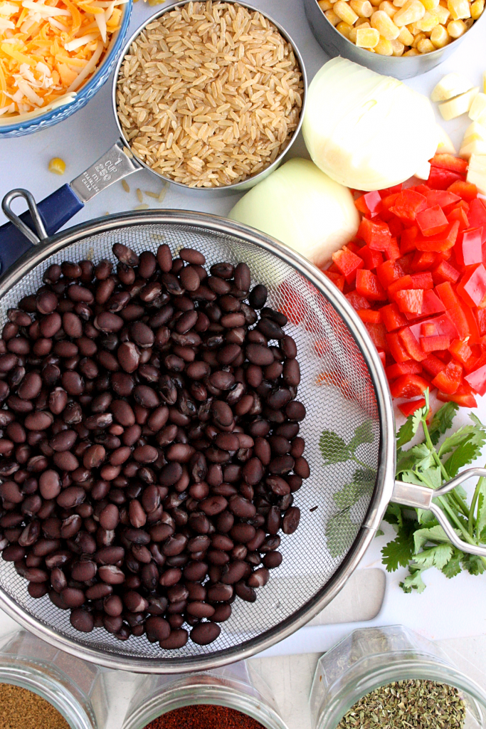 Ingredients: brown rice, beans, cheese, corn, onion, red pepper and cilantro.