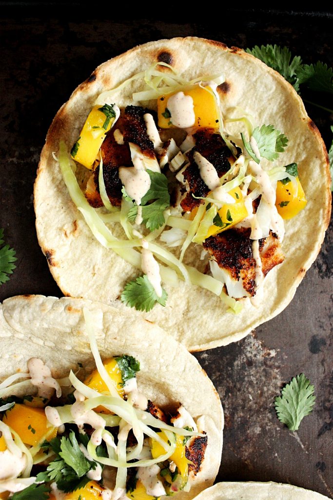 Easy Tilapia Fish Tacos with Mango Salsa and Slaw