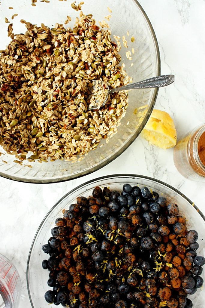 Mix the topping and toss the blueberries in maple, cinnamon, and lemon