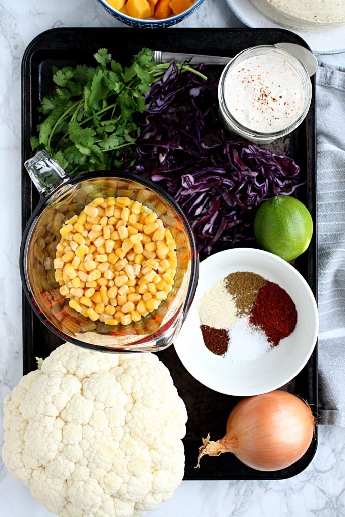 The ingredients you need for sheet pan veggie tacos.