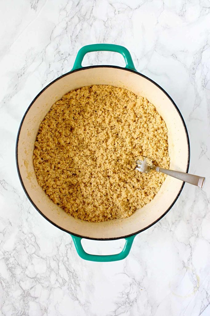 Pot of cooked, whole wheat couscous.